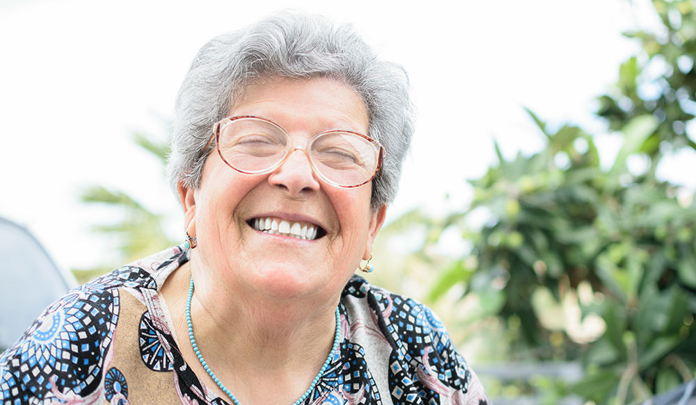 older woman wearing dentures